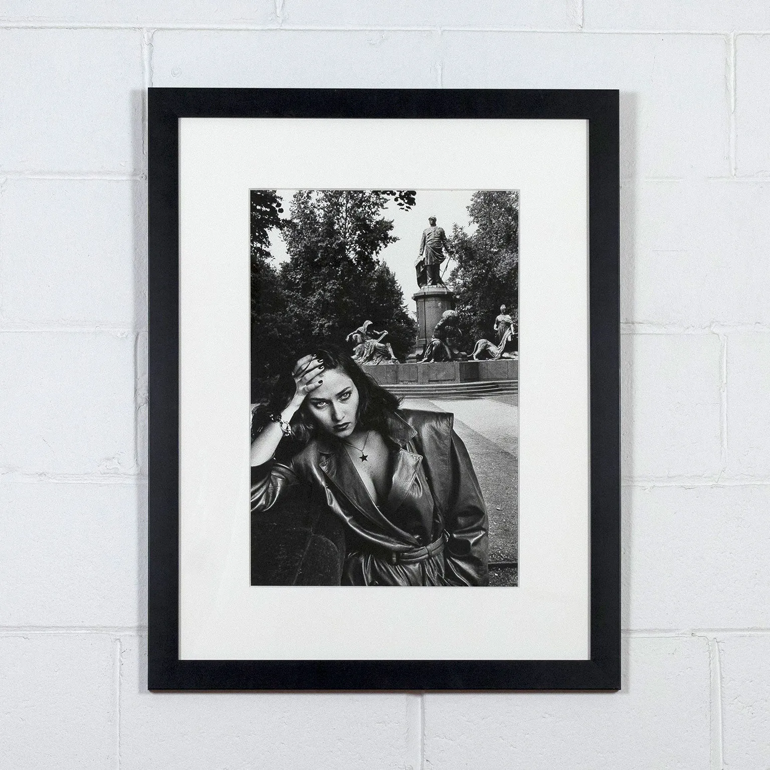 HELMUT NEWTON, "YOUNG WOMAN AND BISMARCK MONUMENT, BERLIN", 1979
