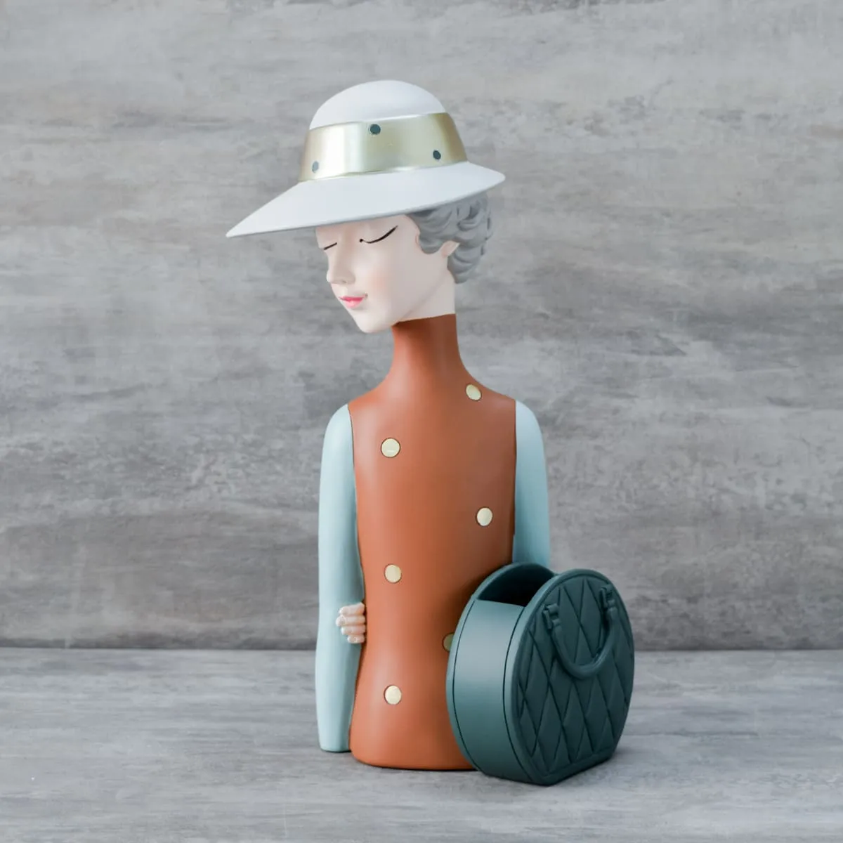 Home Artisan Andrea with a Bag Sculpture
