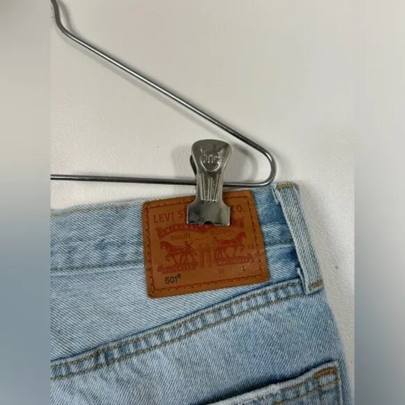 SIZE 27 High Waisted Levi’s Denim Light Wash Distressed Shorts