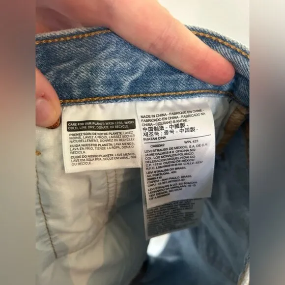 SIZE 27 High Waisted Levi’s Denim Light Wash Distressed Shorts