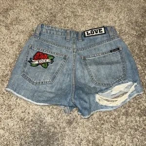 Urban outfitters bardot denim high waisted patched distressed shorts size 26